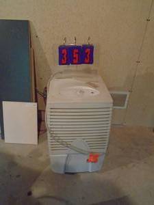 lot 353 image: GE dehumidifier. Larger unit. As shown.