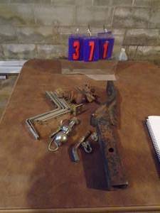 lot 371 image: Flat of trailer hitch items. As shown.