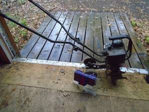 lot 393 image: Troy Bilt mini tiller. Used condition. Been sitting a few years but turns over. Untested. As shown.