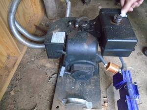 lot 394 image: Tecumeh engine & flex pipe. Looks like snowblower motor. As shown.