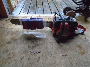 lot 401 image: Jonsrud 70E chainsaw. Fires on ether. Good used condition. As shown.
