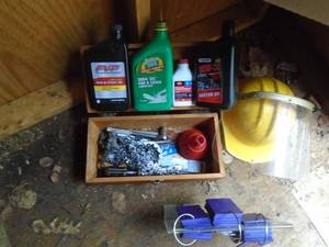 lot 408 image: Box of chainsaw parts & helmet. As shown.
