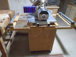 lot 111 image: Performax 16-32 sander. 110 v with power feed & cabinet extra paper. As shown.