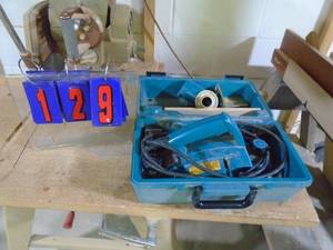 lot 129 image: Makita 3 power planer in box. As shown.