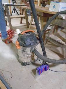 lot 137 image: Rigid 6 hp 10 gal shop vac with hose & nozzles. As shown.