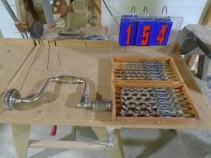 lot 154 image: Brace & 13 piece bit set in wood box. As shown.
