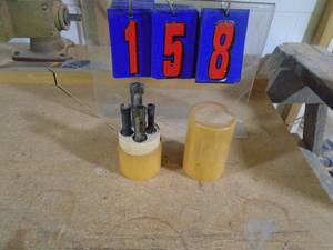 lot 158 image: Set of plug cutters in wood tube. As shown.