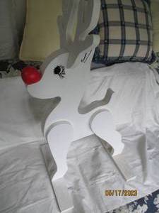 lot 33 image: Wood cut-and-painted Reindeer holid...