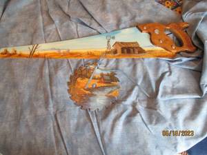 lot 76 image: Hand painted Hand Saw and saw blade...