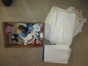 lot 152 image: Box of Assorted clothing type mater...