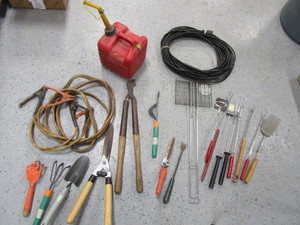 lot 31 image: Jumper Cables, Gas Jug, Extension Chord, Garden Tools, Grilling Utensils