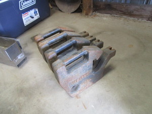 lot 46 image: (4) 55lb Kubota Utility Tractor Weights