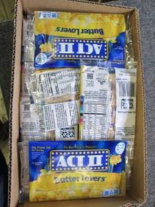 lot 75 image: 21  2.75 oz packages of act 2 butt...