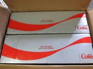 lot 252 image: 2 packs of 12 12oz cans of diet co...