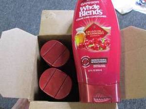 lot 264 image: case of 4 bottles of garnier whole ...