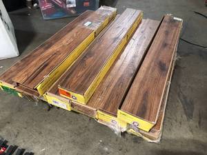 lot 7 image: 8 Boxes of Home Decorators Collection Distressed Brown Hickory 12 mm T x 6.3 in. W Laminate Wood Flooring (15.5 sqftcase)  Customer Returns See Pictures
