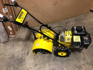 lot 19 image: Champion Power Equipment 19 in. 212cc 4-Stroke Gas Garden Counter Rotating Rear Tine Tiller with Self-Propelled Agricultural Tires   Customer Returns See Pictures