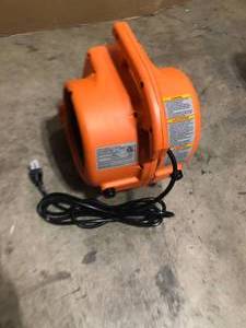 lot 48 image: RIDGID 600 CFM 3-Speed Portable Blower Fan Air Mover with Daisy Chain, 3 Operating Positions for Water Damage Restoration   Customer Returns See Pictures