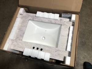 lot 49 image: Home Decorators Collection 31 in. W x 22 in. D Stone Effects Cultured Marble Vanity Top in Winter Mist with Undermount White Sink  Customer Returns See Pictures