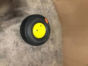 lot 51 image: Arnold 20 in. x 8 in. Rear Wheel Assembly with Turf Saver Tread for John Deere Riding Lawn Mowers See Pictures