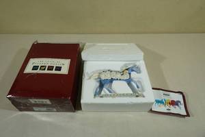 lot 119 image: The Trail of Painted Ponies Penguin Express Figure