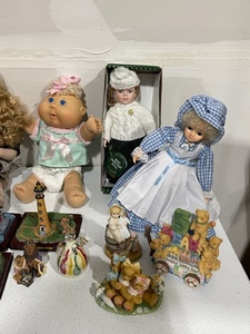 lot 14 image: Large Assortment of Dolls and Other Decor