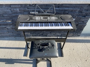 lot 1 image: Alesis Melody 61 Keyboard with Stand and Bench