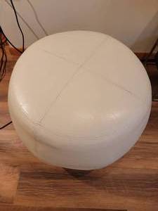lot 90 image: Pier One Cream Leather Ottoman