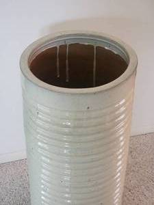 lot 45 image: Interlude Glazed Terra Cotta Umbrella Stand