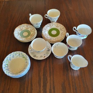 lot 91 image: Mixed Lot Of Bone China Saucers, Tea Cups, And Bowls