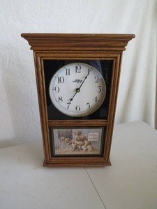 lot 106 image: Wisconsin Clock Company Puppies for Sale Wall Clock