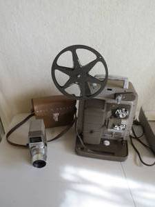 lot 141 image: Vintage Bell and Howell Camera And Projector