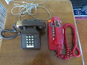 lot 160 image: Two Vintage Phones - Pushbutton Desk phone and Red Pushbutton Wall Phone