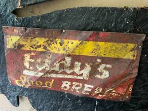 lot 141 image: Eddys Good Bread Metal Sign Mounted on Wooden Moose