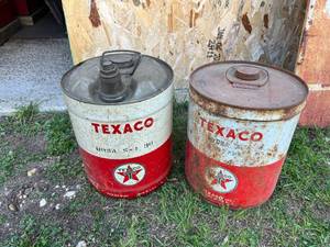 lot 76 image: Texaco 5 Gallon Oil Cans