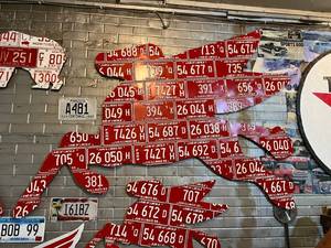lot 164 image: Large Pegasus Horse License Plate Art