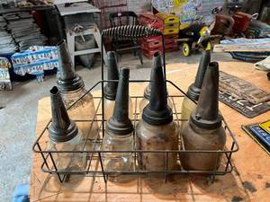 lot 180 image: Vintage Glass Oil Jars with Carrier