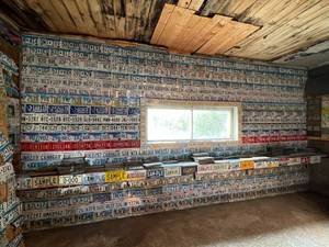 lot 190 image: Complete Wall & Shelf of License Plates