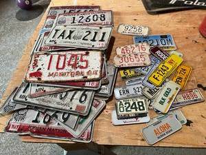 lot 216 image: Native America License Plates, Bicycle Plates & Novelty Plates