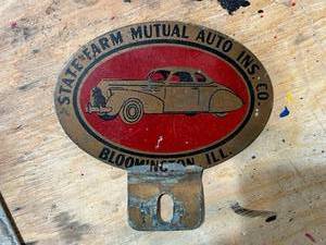 lot 228 image: State Farm Mutual Auto Ins Co License Plate Tag, Vintage Wrenches & Street Work Sign