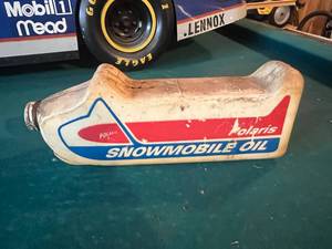 lot 247 image: Polaris Snowmobile Oil Bottle