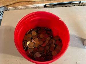 lot 260 image: Tall Folgers Can Approx Half Full of Canadian Pennies