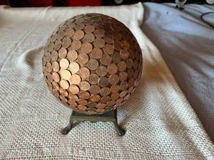 lot 261 image: Globe Covered in US Pennies on Base
