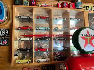 lot 269 image: Display Cabinet Full of Various Year Corvettes