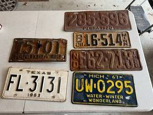 lot 388 image: Vintage License Plates - 1920 Penna, 1928 MN, 1926 ND, 1950 Manitoba