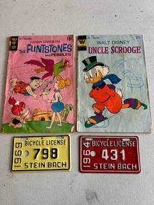 lot 395 image: Comic Books & Bicycle License Plates