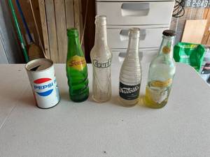 lot 279 image: Old Soda Bottles & Can