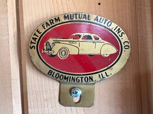 lot 322 image: State Farm Mutual Auto Ins Co Vintage License Plate Topper