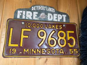 lot 328 image: 1955 MN License Plate with Detroit Lakes Fire Dept Topper