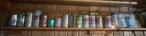 lot 450 image: Shelf of Beer Cans